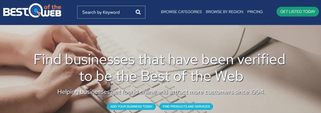 Best of the Web homepage featuring a search bar and text promoting business listings, with a close-up of hands typing on a keyboard.